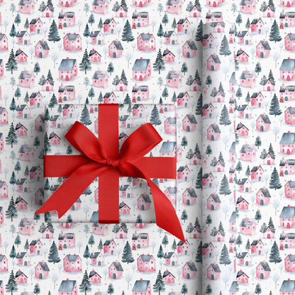 Pink Cottages Dance Through Snowfall